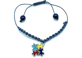 pulsera de concienciacion del autismo con piezas de puzzle